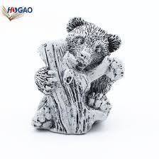 Resin Bear Holding Wood