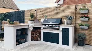 this blue diy outdoor kitchen is filled