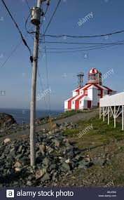 Power Grid Pylon In Front Of Cape Bonavista Lighthouse In
