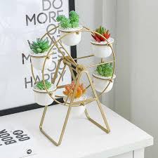 This ceramic pot with stand is a mini landscape which reflects the home owner's personality and aesthetic taste. Modern Ferris Wheel Flower Pots White Ceramic Planters With Rotatable Metal Stand Hanging Succulents Plant Pots Home Decoration Flower Pots Planters Aliexpress