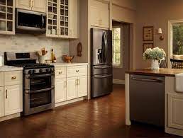 Is your kitchen in need of an overhaul? 10 Decorating Ideas For Above Kitchen Cabinets Stainless Steel Kitchen Appliances Kitchen Design Black Stainless Steel Appliances