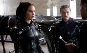 katniss costumes in the hunger games