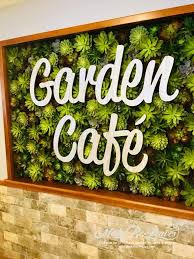 Faux Green Walls With Signage And
