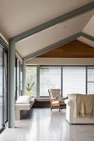 simple living room below gable roof