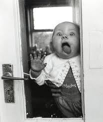 Baby Trying To Lick Door Glass Funny Image