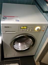 Hello, i have a washing samsung washing machine and a light came on showing a red key. Washer Dryer Wikipedia
