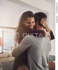 happy couple and hug in home for love