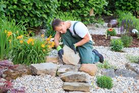 In this small space, rocks are stacked to create a sculptural water feature, while a single boulder placed strategically on the other side of the path helps balance the composition. 16 Diy Landscaping Projects For Your Yard Extra Space Storage