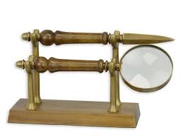 Magnifying Glass And Letter Opener On A