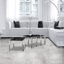 Because the wood floor extended into the living room, they created a transition line with a plunge cutter. Canada Grey Slate Effect Porcelain Floor Tile