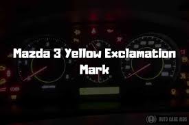 mazda 3 yellow exclamation mark explained