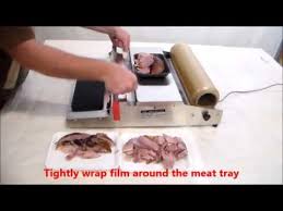 Meat Packaging With Meat Film And A Meat Wrapper