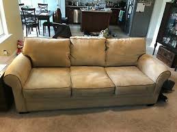 rooms to go beige couch sofa cindy