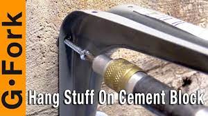 how to hang shelves on cement block