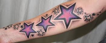 One unique style that you can try is to have a disney styled star tattoo cluster on your leg as shown in this picture. 25 Star Tattoo Designs For Men And Women