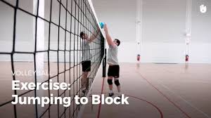 exercise jumping to block volleyball