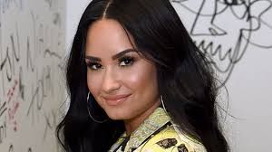 While the color is certainly bold, the singer made it work with dark roots and a black motorcycle jacket. Demi Lovato Dyed Her Hair Neon Green Photos Allure
