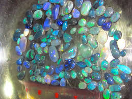 whole black opals about 120 natural
