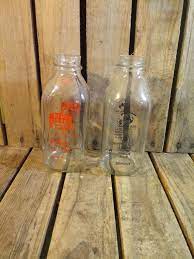 2 Vintage Glass Milk Bottles De