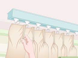 how to hang curtains from the ceiling