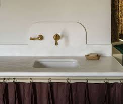 curved backsplashes in the kitchen and bath