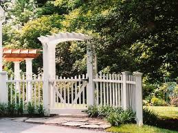 White Picket Fence With Gate And Arbor