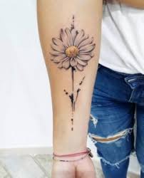 It's easy to fit it just about anywhere on your body. Daisy Tattoos Representing Innocence Purity Peace And Youth