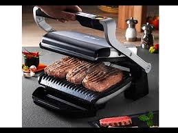 It also has a defrost button just in case you forget to take something out for dinner. T Fal Optigrill Plus Sharper Image