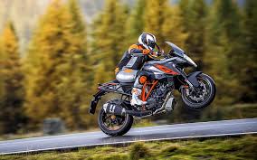 The 2020 ktm 1290 super duke gt. Hd Wallpaper Ktm 1290 Super Duke Gt 2016 Black And Orange Naked Motorcycle Wallpaper Flare