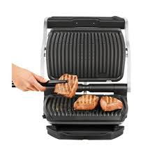 It is very rare that you see customers overwhelmingly rave about a product as highly as they have with this indoor grill. T Fal Optigrill 93 Sq In Black Stainless Steel Non Stick Indoor Grill Gc712d54 The Home Depot