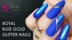 royal blue gold glitter nails you