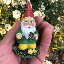 garden gnome with trowel sprouted dreams
