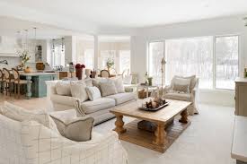 carpeted living room with white walls