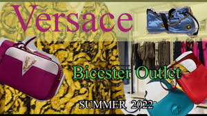 versace outlet bicester village summer