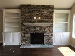 Stacked Stone Fireplace With A