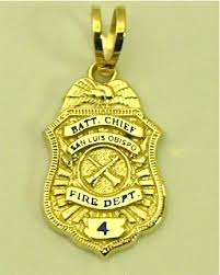 sm badge 14kt gold pendant