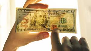 8 ways to spot counterfeit money