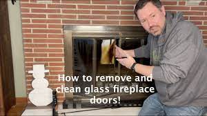 remove and clean glass fireplace doors