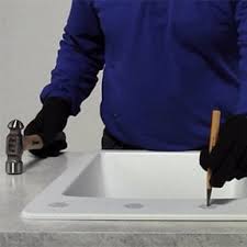 tap hole in a ceramic or granite sink