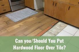 put hardwood floor over tile
