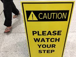 slippery floor surface warning sign