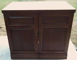 Front doors open to reveal spool storage on left side and 4 drawers on the right. Very Nice Parsons Motorized Electric Lift Sewing Quilting Machine Cabinet 76058 1821531688