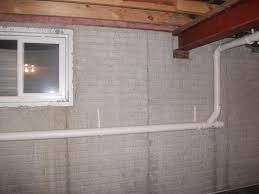 water pipes behind basement insulation