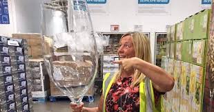 ginormous glass holding 25 bottles of
