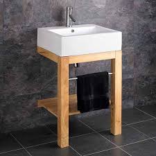 bathroom basin with wooden stand