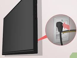 install a flat panel tv on a wall with