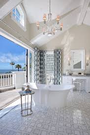 Take this same easy idea and apply it to large photo frames. 20 Luxurious Bathrooms With A Scenic View Of The Ocean