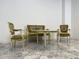 vine sofa with armchairs and table