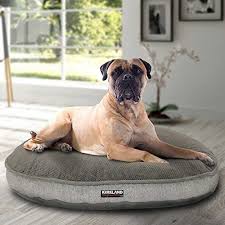Some owners mention great endurance, even after years of use and machine washing, although others, whose dogs are chewers, disagree. Kirkland Signature Machine Washable Luxury Pet Bed You Can Get More Details By Clicking On The Image It Is Am Luxury Pet Beds Round Dog Bed Luxury Pet