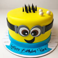 Perfect for the munion party theme. Minion Design Cake Eggless Aubree Haute Chocolaterie